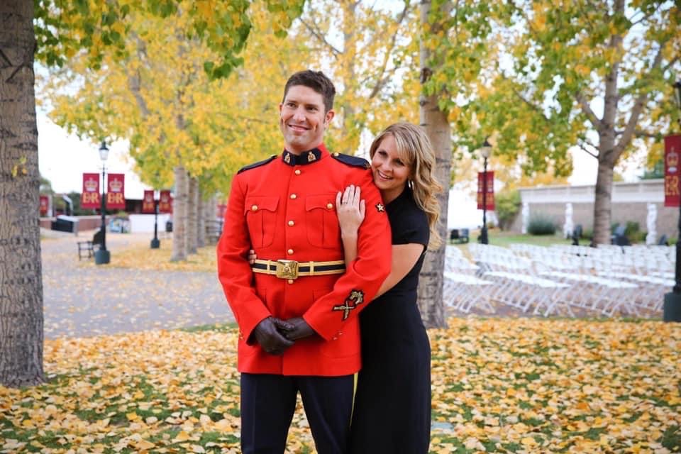 Jeremy Hudec in his RCMP red serge with his wife Laura, among autumn leaves